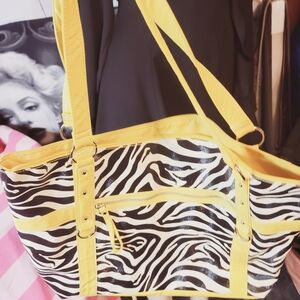Chateau Zebra print with Yellow trim over the shoulder bag